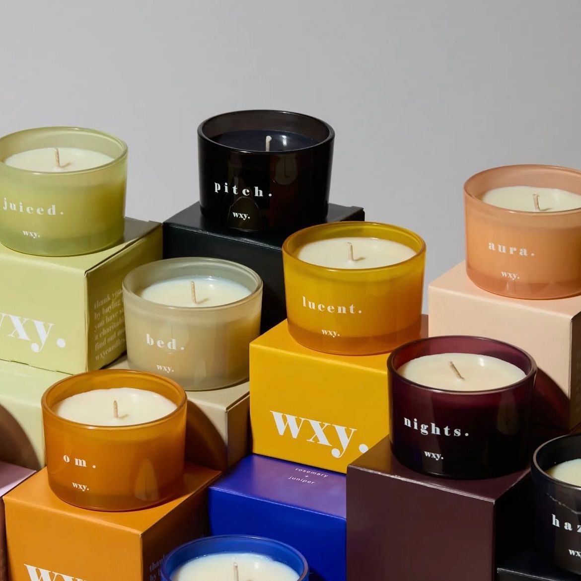 A playful arrangement of colourful hand-poured candles